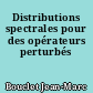 Distributions spectrales pour des opérateurs perturbés